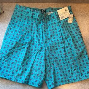 Vintage Lacoste Men's Teal Patterned Flat Front Shorts
